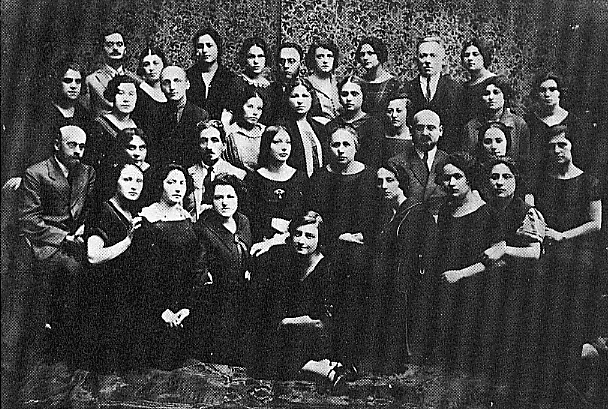 Korczak sitting on the left