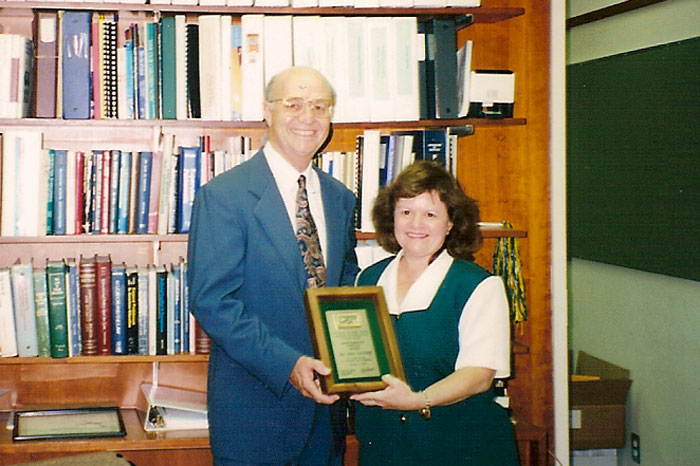 Dr. Ron Linder presented with USF Meritorious Service Award, 1995