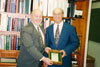 Thumbnail of Dean Steve Permuth congratulating Dr. Ron Linder on receiving his award.