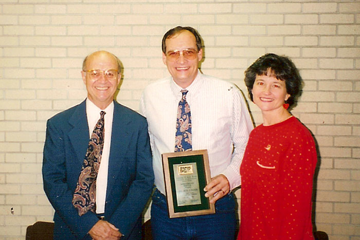 Dr. Ron Linder and Bruce Burnham, pictured with his wife.