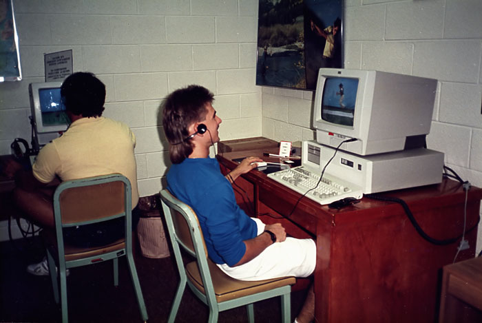 a man sitting at a computer