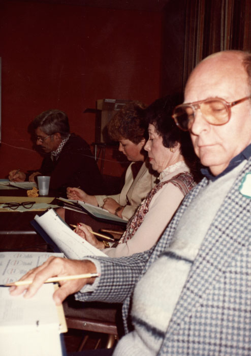 a group of faculty writing