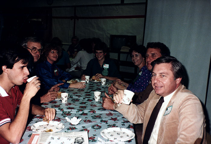 a group of faculty sitting down to a meal