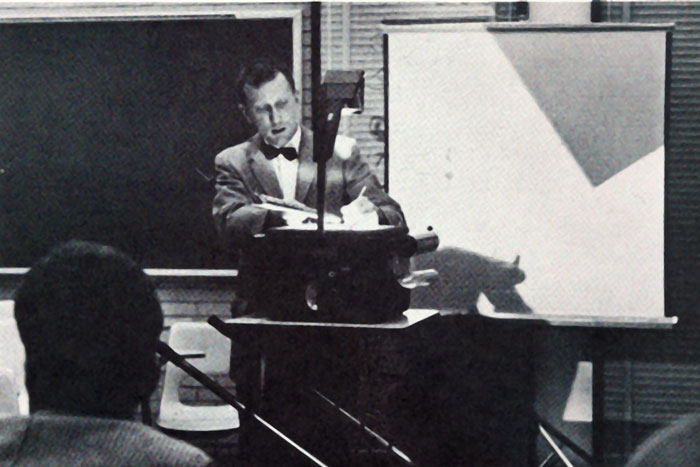 Dr. Robert Shannon at an overhead projector