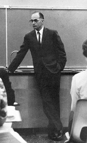Dr. Donald Lantz standing in front of a chalkboard