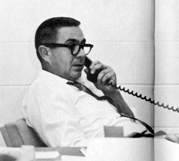 Dr. Walter Musgrove talking on the phone