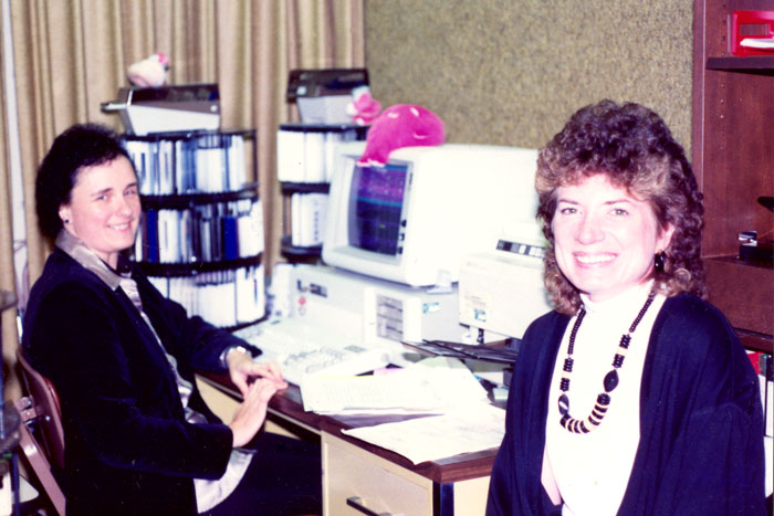 Judy Trotter and Susan Foster in front of a computer