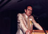 thumbnail of Dean William Katenmeyer at a podium
