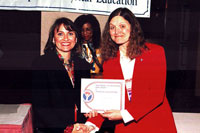 Student accepting award