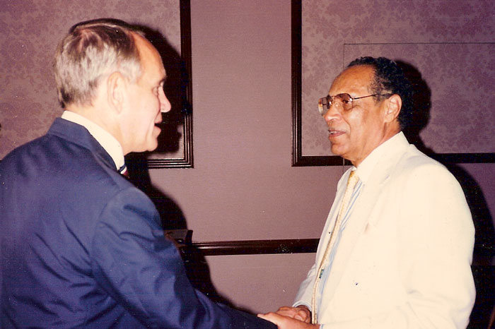 Frank Borkowski and Dr. Richard Pride shaking hands