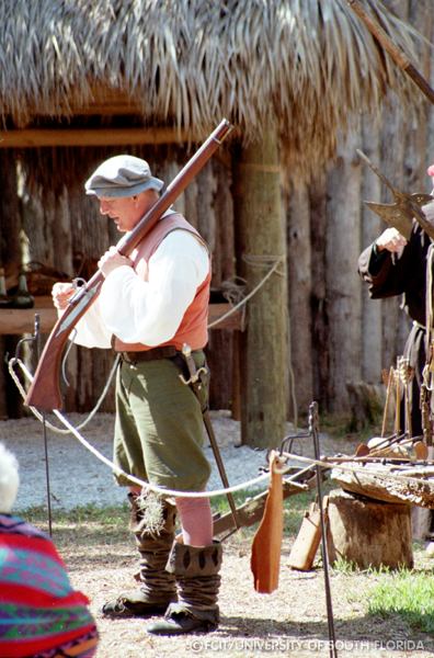 Conquistador displaying a musket