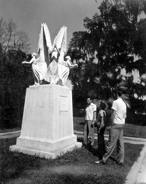 Unidentified men view the Four Freedoms Monument: Madison, Florida