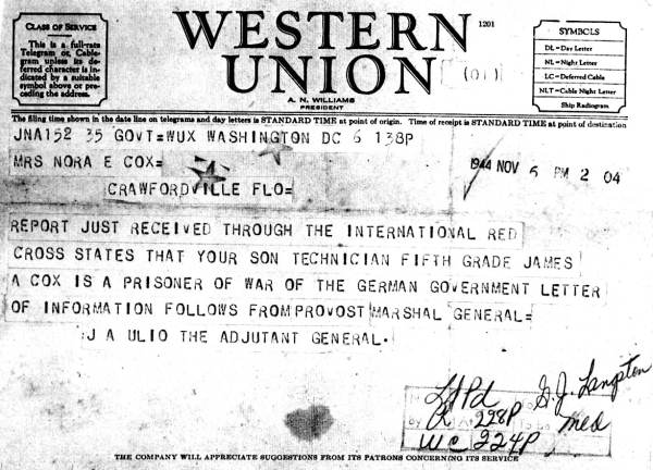 Telegram notifying Mrs. Nora E. Cox that her son is a prisoner of war