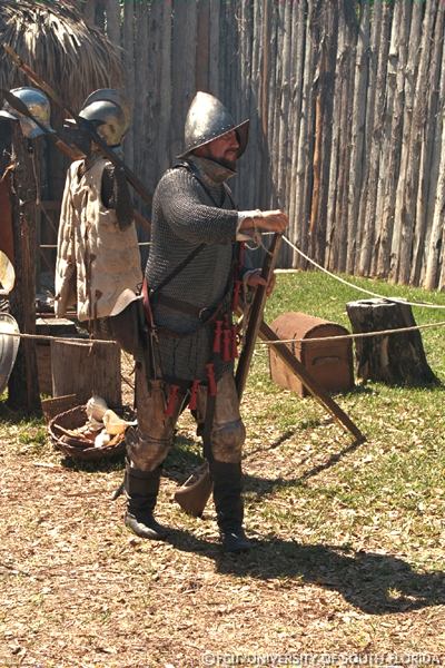 Conquistador loading a musket