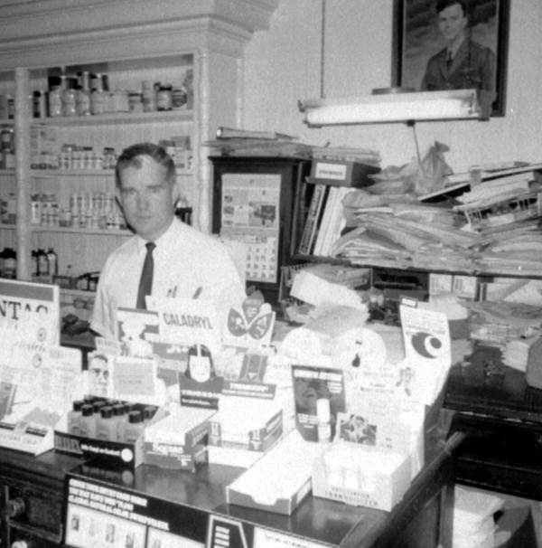 Picture of Colin Kelly in Pharmacist Murray Comer's store