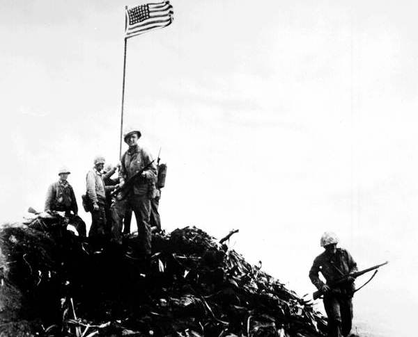 Members of 40 man patrol planting first American flag at Iwo Jima